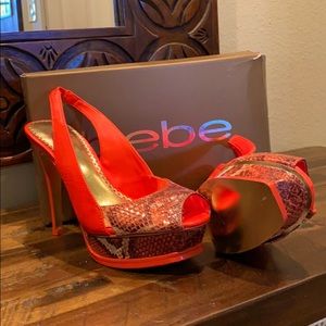 BEBE Orange and Orange Snake Skin Peep Toe Pumps